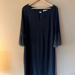 Jackie Jon Boat Neck Circular Flounce Sleeve Zipper Back Jersey Dress